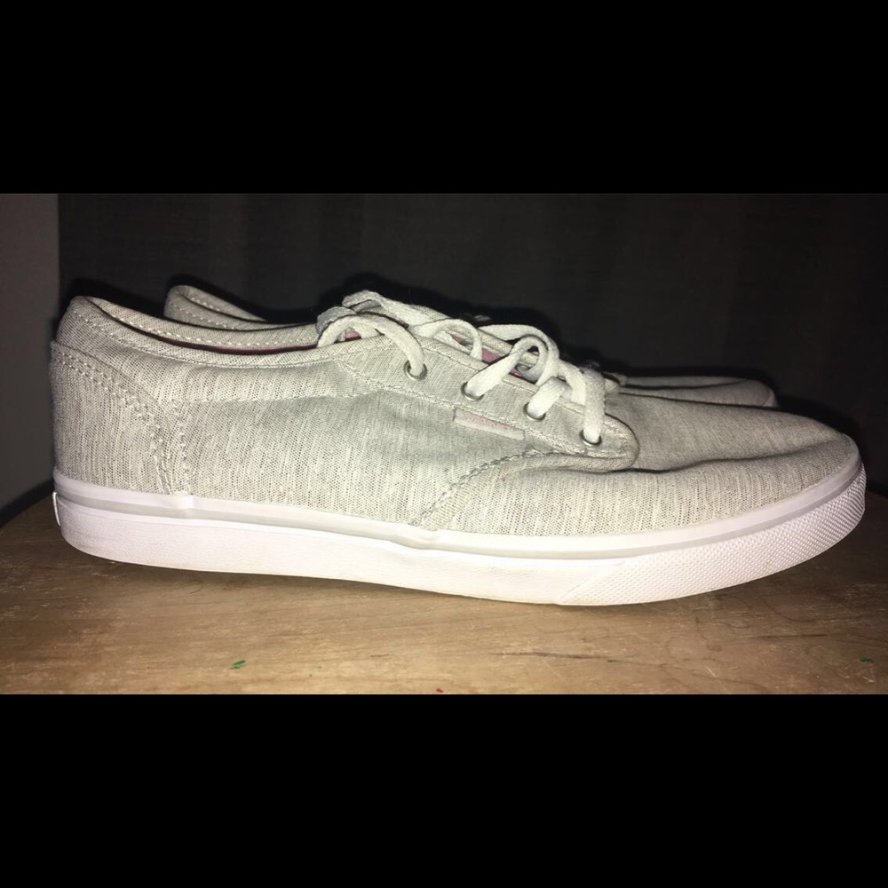 Light grey vans.